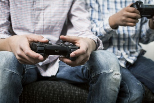 Boy holding video game controller